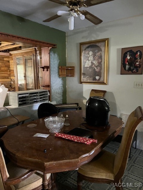 dining room with ceiling fan and cooling unit