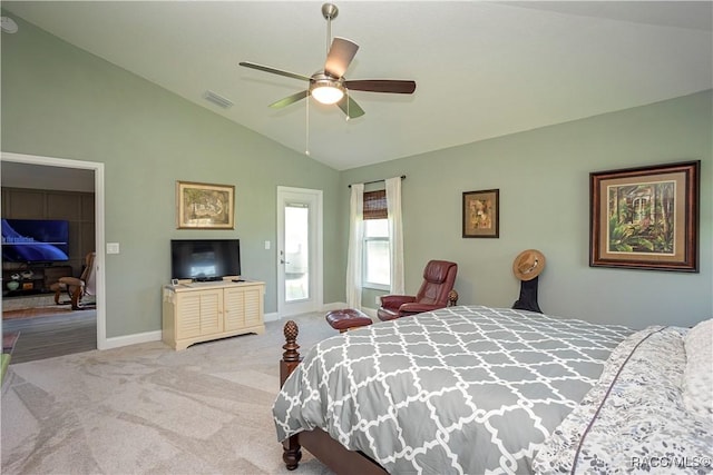 carpeted bedroom with visible vents, ceiling fan, baseboards, and vaulted ceiling