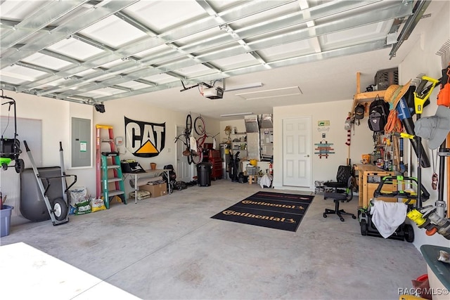 garage with electric panel and a garage door opener