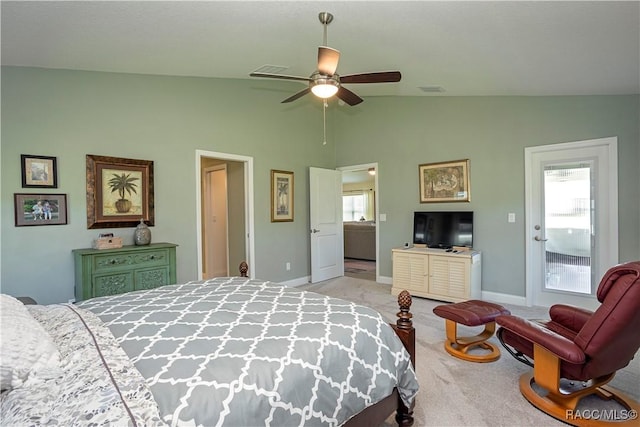 bedroom with vaulted ceiling, baseboards, visible vents, and light carpet