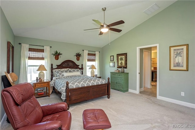 bedroom featuring visible vents, light colored carpet, a ceiling fan, and baseboards