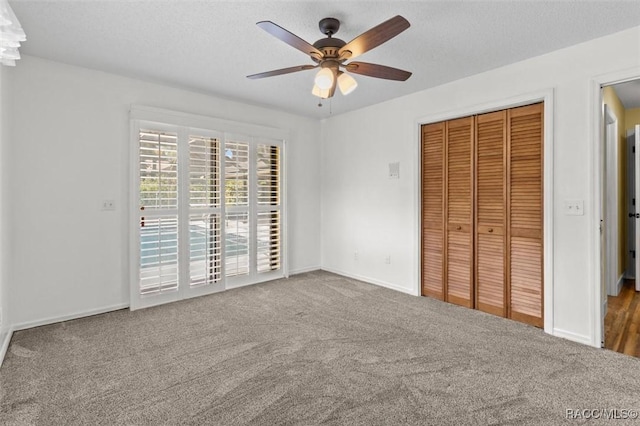 96 N Fresno Ave, Hernando, FL 34442 - unfurnished bedroom featuring carpet flooring, a closet, and a ceiling fan