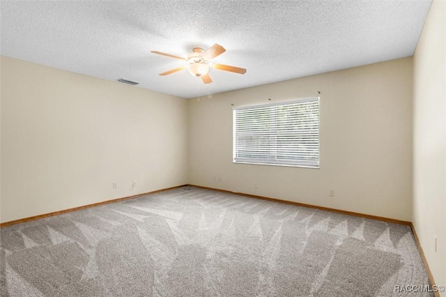 96 N Fresno Ave, Hernando, FL 34442 - empty room featuring a ceiling fan, carpet, and a textured ceiling