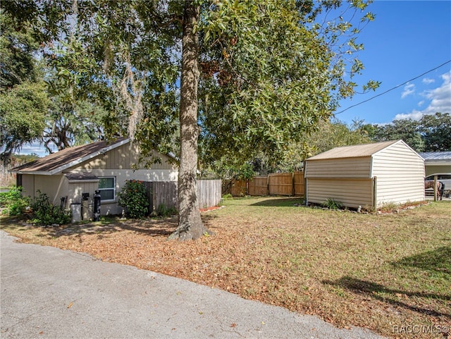 exterior space with a shed