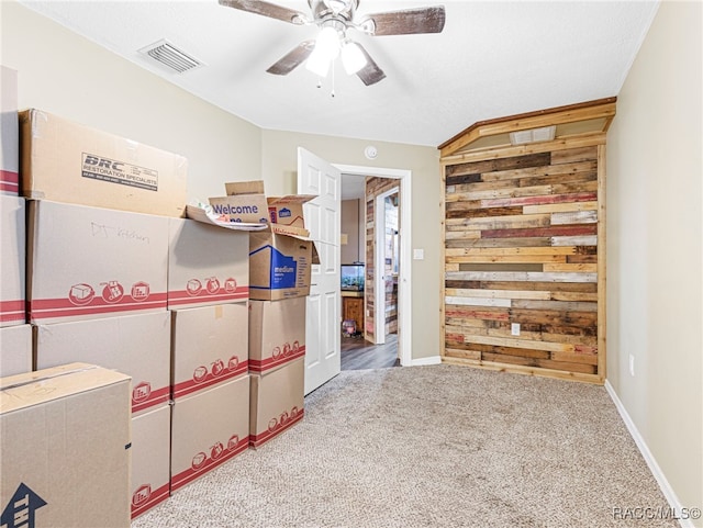 interior space featuring ceiling fan