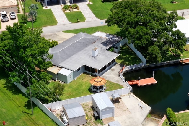 drone / aerial view with a water view