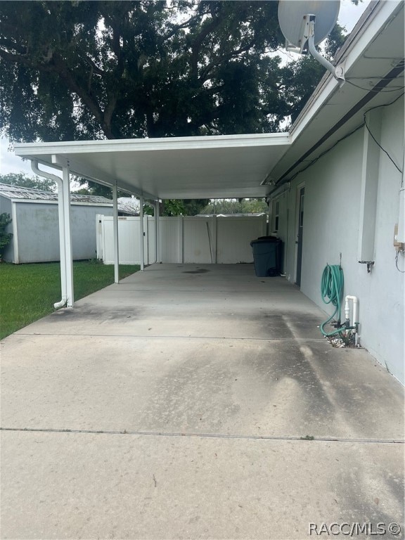 garage with a carport