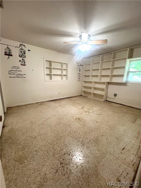 interior space featuring ceiling fan