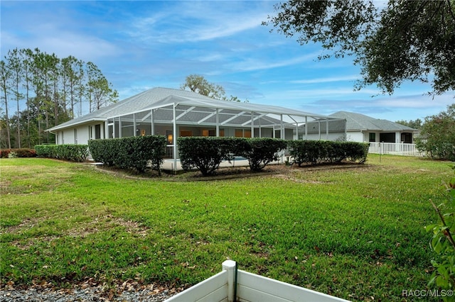 view of yard with a lanai