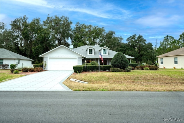 view of front facade featuring a garage and a front yard