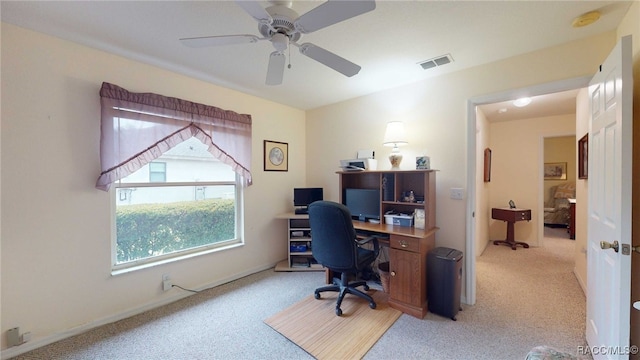 office area with ceiling fan and light colored carpet