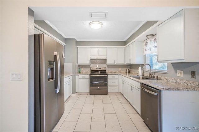 kitchen with sink, white cabinets, stainless steel appliances, and ornamental molding