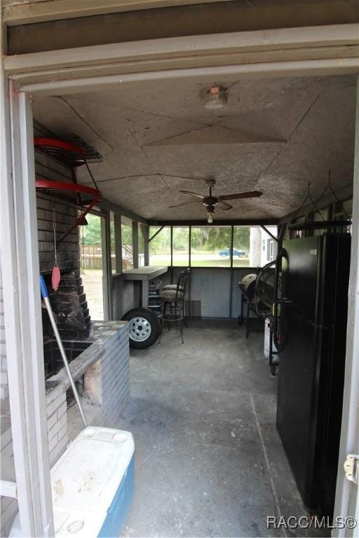 view of patio / terrace featuring a ceiling fan