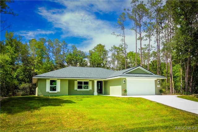 single story home with a garage and a front lawn