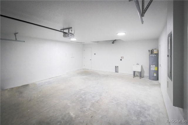 garage with sink, a garage door opener, and water heater