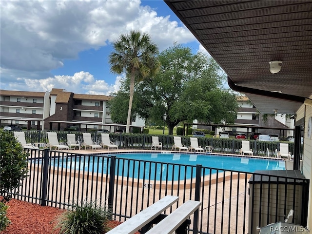 view of swimming pool featuring a patio