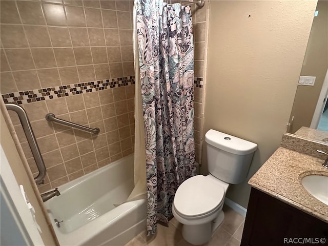 full bathroom with toilet, shower / tub combo, vanity, and tile patterned floors