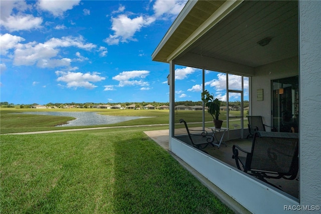 exterior space with a water view