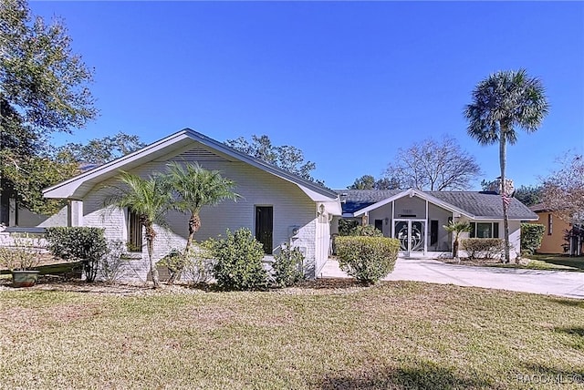 view of home's exterior with a lawn