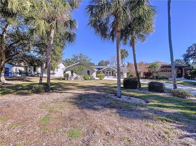 view of front facade with a front lawn