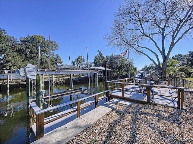 view of dock featuring a water view