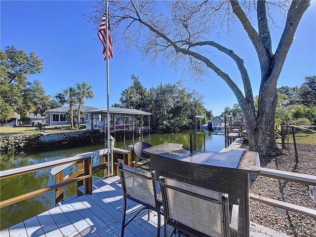 dock area featuring a water view