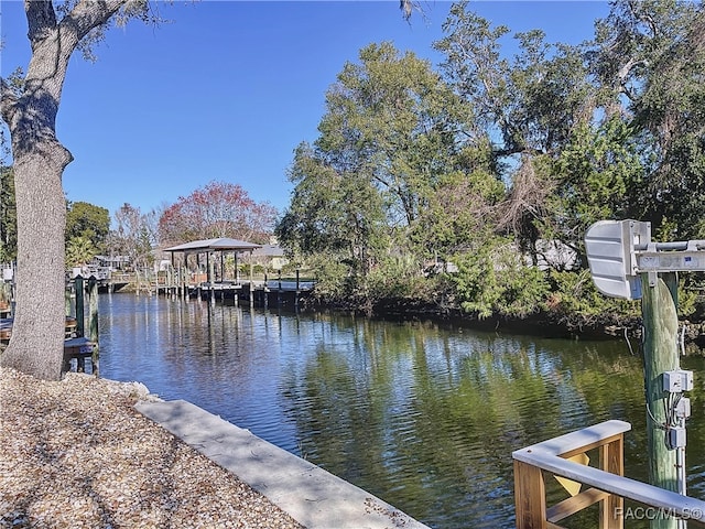 view of dock with a water view