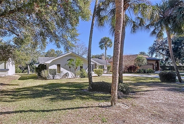 view of front of home with a front lawn