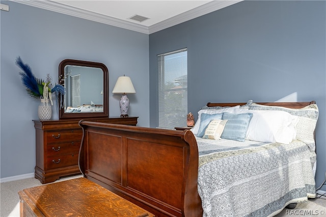 bedroom featuring carpet floors and crown molding