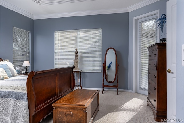 carpeted bedroom with crown molding