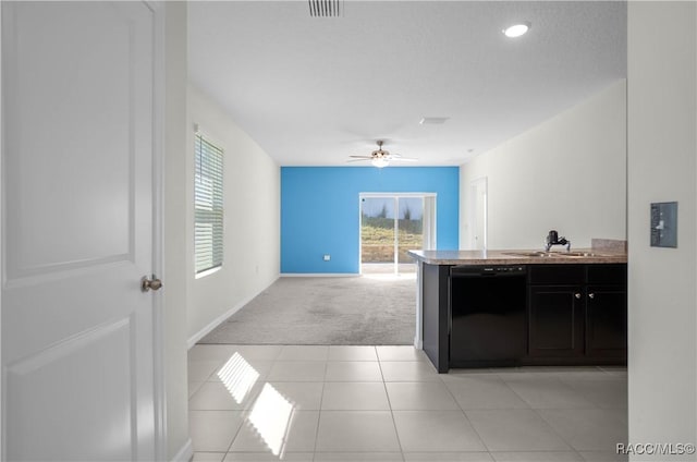 3525 N Burroughs Path, Beverly Hills, FL 34465 - kitchen with dishwasher, light colored carpet, open floor plan, light tile patterned flooring, and a ceiling fan