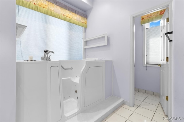 bathroom with tile patterned flooring