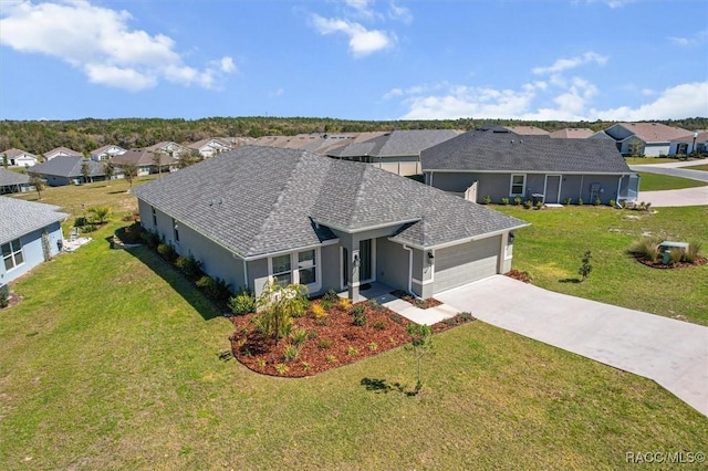 drone / aerial view with a residential view