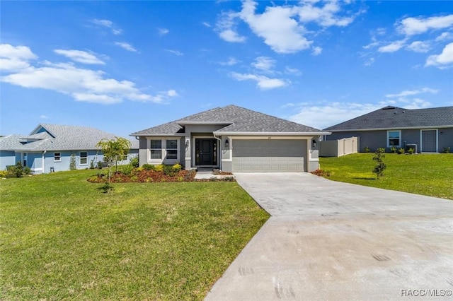 view of front facade with stucco siding, a front lawn, fence, concrete driveway, and an attached garage