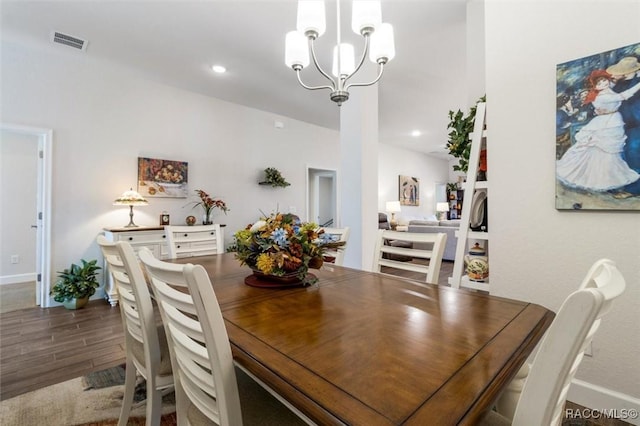 dining room with recessed lighting, wood finished floors, visible vents, and a chandelier