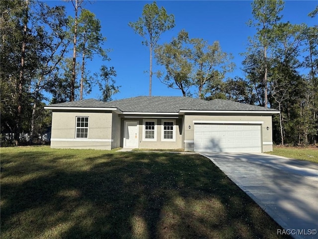 ranch-style home with a front lawn and a garage