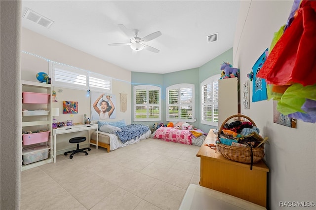 bedroom with tile patterned flooring and ceiling fan