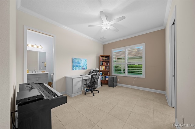 office space featuring light tile patterned flooring, baseboards, crown molding, and a ceiling fan