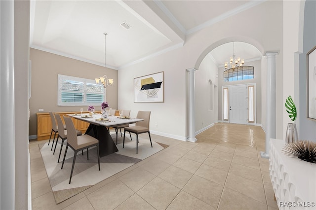 dining space with ornate columns, ornamental molding, light tile patterned floors, and a chandelier