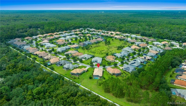 aerial view with a forest view and a residential view