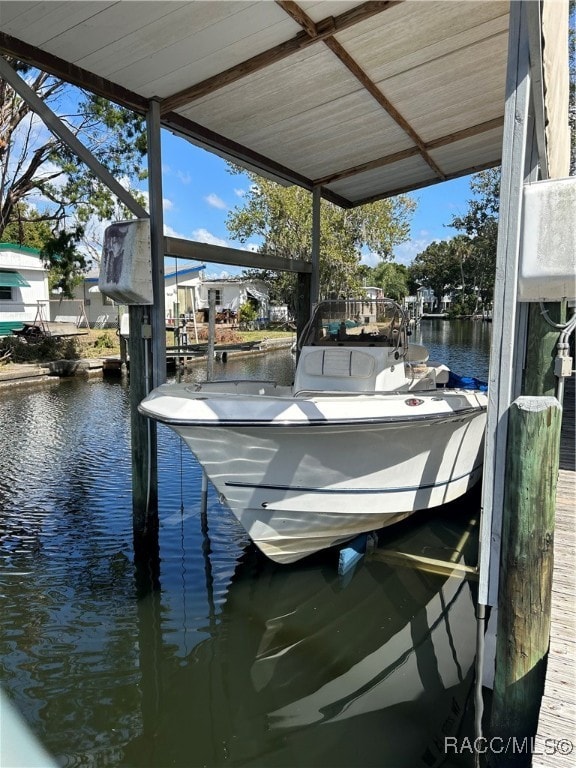 dock area featuring a water view