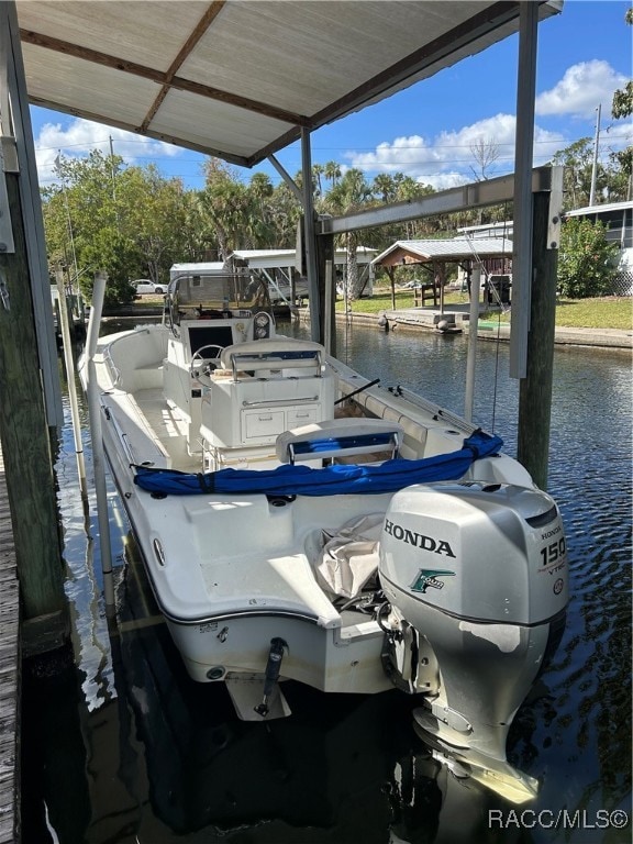 dock area featuring a water view