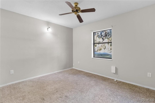 9780 W Tennessee Ln, Crystal River, FL 34428 - carpeted empty room featuring ceiling fan
