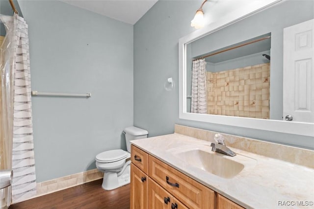 9780 W Tennessee Ln, Crystal River, FL 34428 - bathroom featuring vanity, wood-type flooring, and toilet