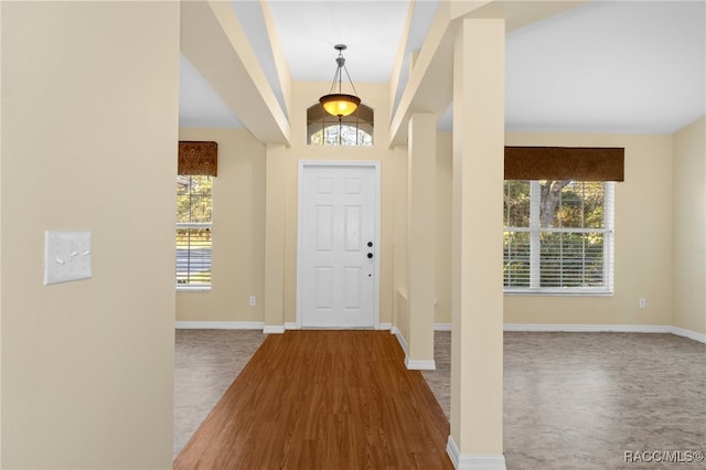 foyer entrance featuring hardwood / wood-style floors