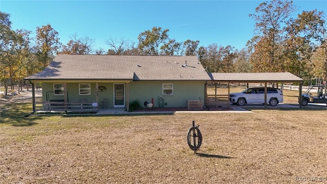 single story home featuring a carport and central air condition unit