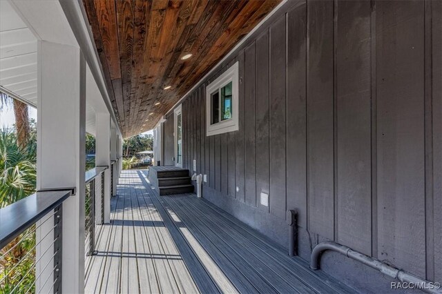 deck featuring a water view