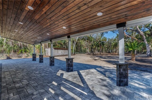 view of patio with a shed