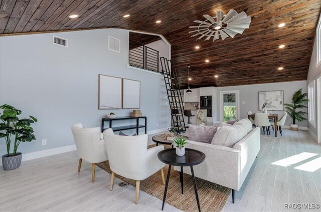 sitting room featuring light hardwood / wood-style flooring