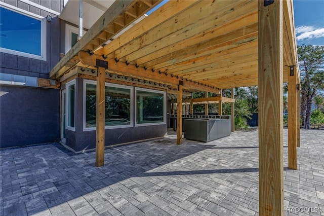 view of patio featuring a pergola